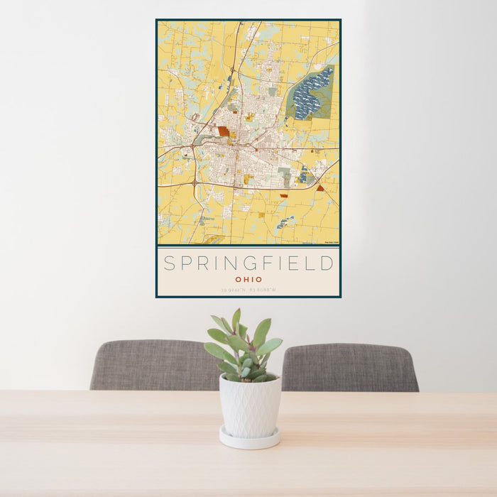 24x36 Springfield Ohio Map Print Portrait Orientation in Woodblock Style Behind 2 Chairs Table and Potted Plant