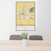 24x36 Springfield Ohio Map Print Portrait Orientation in Woodblock Style Behind 2 Chairs Table and Potted Plant