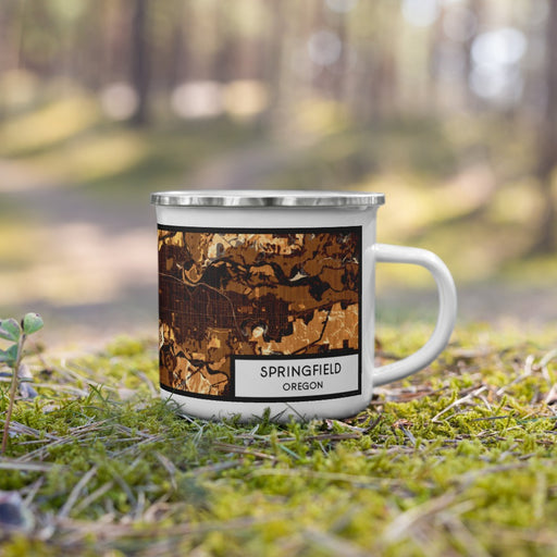 Right View Custom Springfield Oregon Map Enamel Mug in Ember on Grass With Trees in Background
