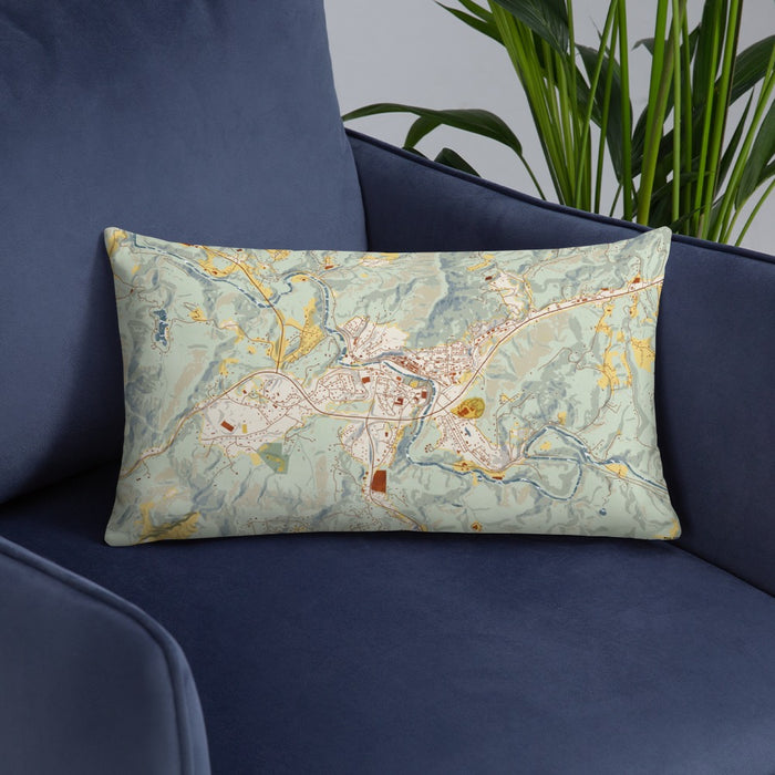 Custom Spruce Pine North Carolina Map Throw Pillow in Woodblock on Blue Colored Chair