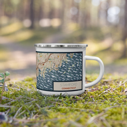 Right View Custom Stamford Connecticut Map Enamel Mug in Woodblock on Grass With Trees in Background