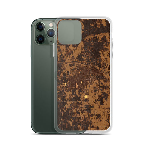 Custom Starkville Mississippi Map Phone Case in Ember on Table with Laptop and Plant