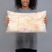 Person holding 20x12 Custom Starkville Mississippi Map Throw Pillow in Watercolor