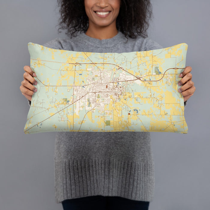 Person holding 20x12 Custom Starkville Mississippi Map Throw Pillow in Woodblock
