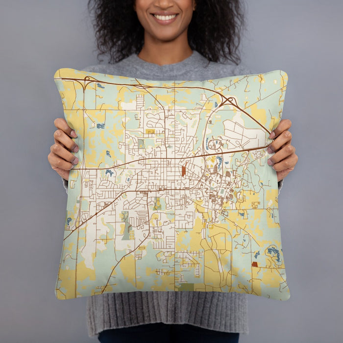 Person holding 18x18 Custom Starkville Mississippi Map Throw Pillow in Woodblock