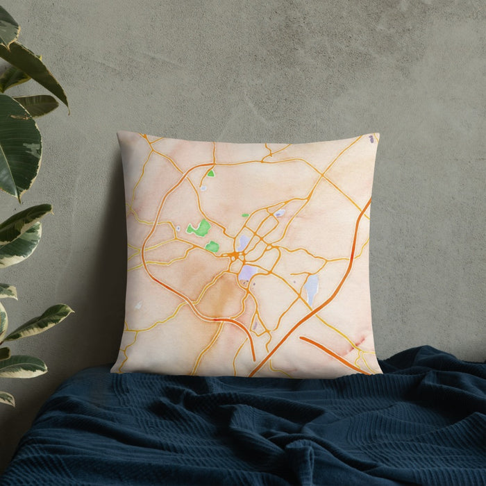 Custom Staunton Virginia Map Throw Pillow in Watercolor on Bedding Against Wall