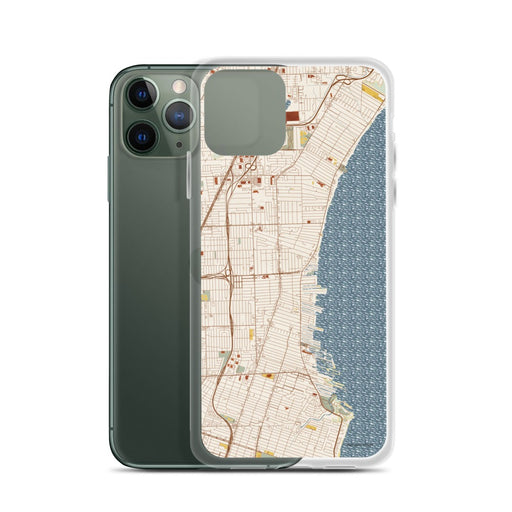 Custom St. Clair Shores Michigan Map Phone Case in Woodblock on Table with Laptop and Plant