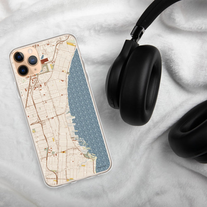 Custom St. Clair Shores Michigan Map Phone Case in Woodblock on Table with Black Headphones