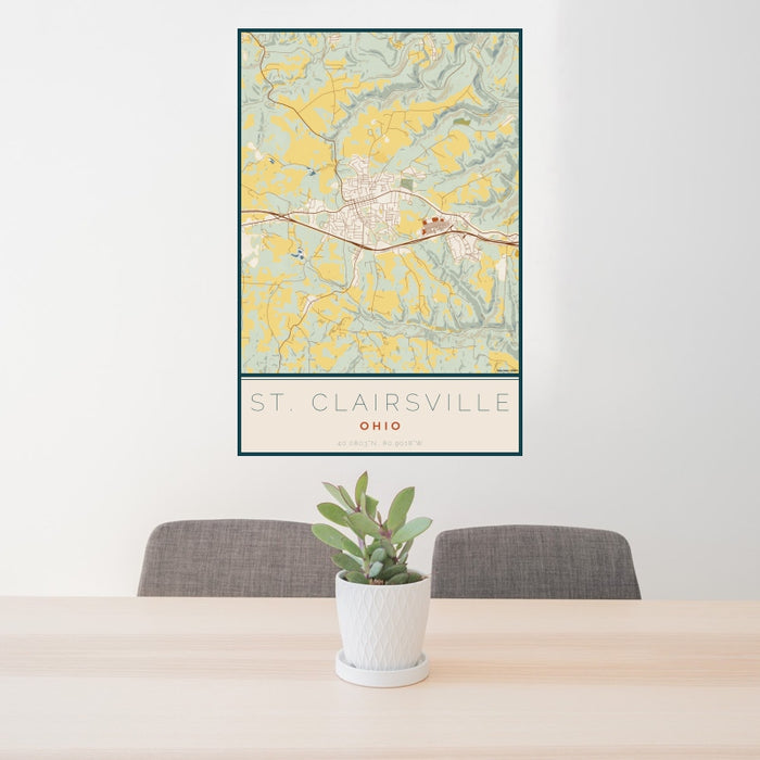 24x36 St. Clairsville Ohio Map Print Portrait Orientation in Woodblock Style Behind 2 Chairs Table and Potted Plant