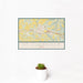 12x18 St. Clairsville Ohio Map Print Landscape Orientation in Woodblock Style With Small Cactus Plant in White Planter