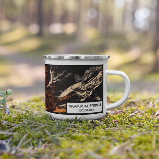 Right View Custom Steamboat Springs Colorado Map Enamel Mug in Ember on Grass With Trees in Background