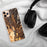 Custom Steamboat Springs Colorado Map Phone Case in Ember on Table with Black Headphones