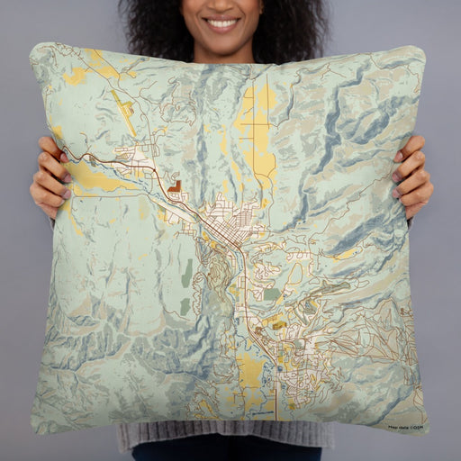 Person holding 22x22 Custom Steamboat Springs Colorado Map Throw Pillow in Woodblock