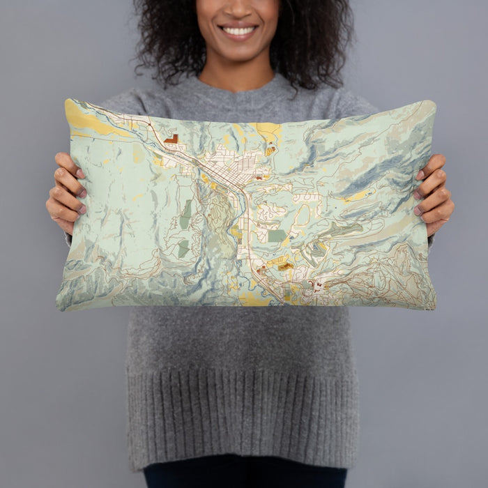 Person holding 20x12 Custom Steamboat Springs Colorado Map Throw Pillow in Woodblock