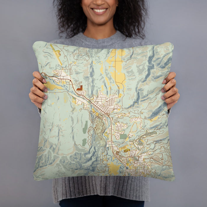 Person holding 18x18 Custom Steamboat Springs Colorado Map Throw Pillow in Woodblock