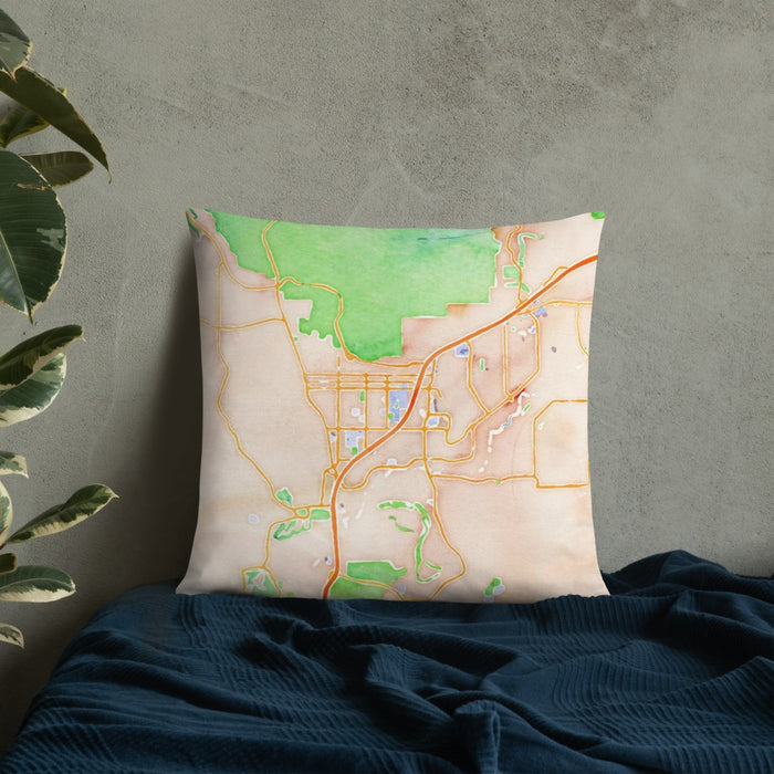 Custom St. George Utah Map Throw Pillow in Watercolor on Bedding Against Wall