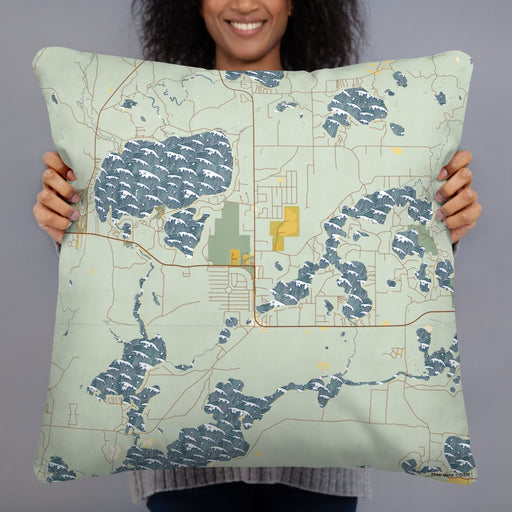 Person holding 22x22 Custom St. Germain Wisconsin Map Throw Pillow in Woodblock
