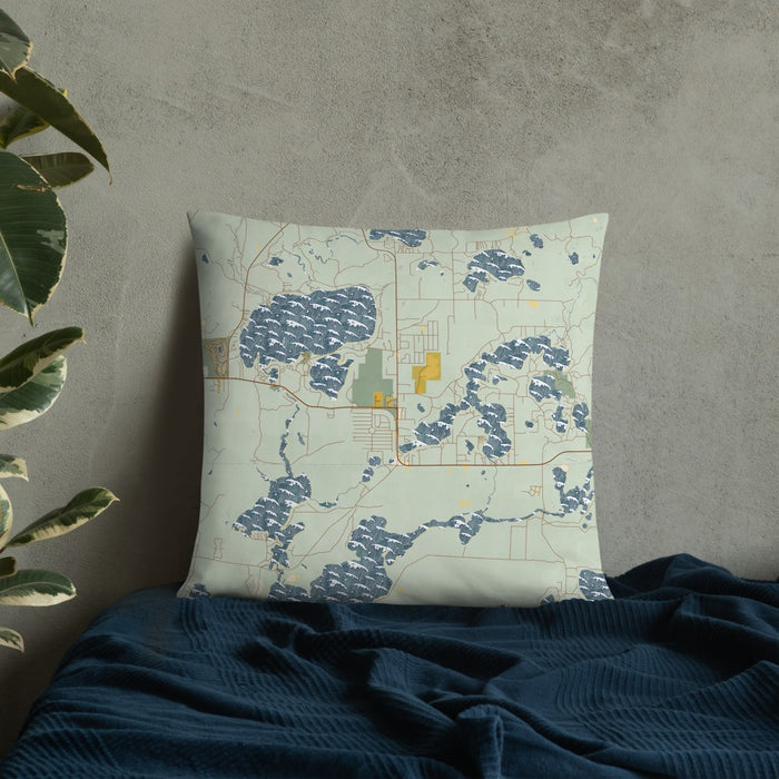 Custom St. Germain Wisconsin Map Throw Pillow in Woodblock on Bedding Against Wall