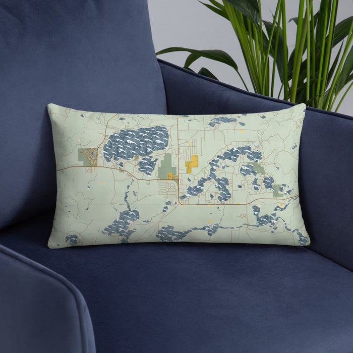 Custom St. Germain Wisconsin Map Throw Pillow in Woodblock on Blue Colored Chair