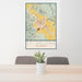 24x36 St. Helena California Map Print Portrait Orientation in Woodblock Style Behind 2 Chairs Table and Potted Plant