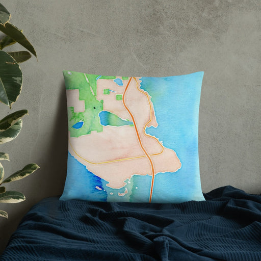 Custom St. Ignace Michigan Map Throw Pillow in Watercolor on Bedding Against Wall