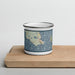 Front View Custom St. Ignace Michigan Map Enamel Mug in Woodblock on Cutting Board