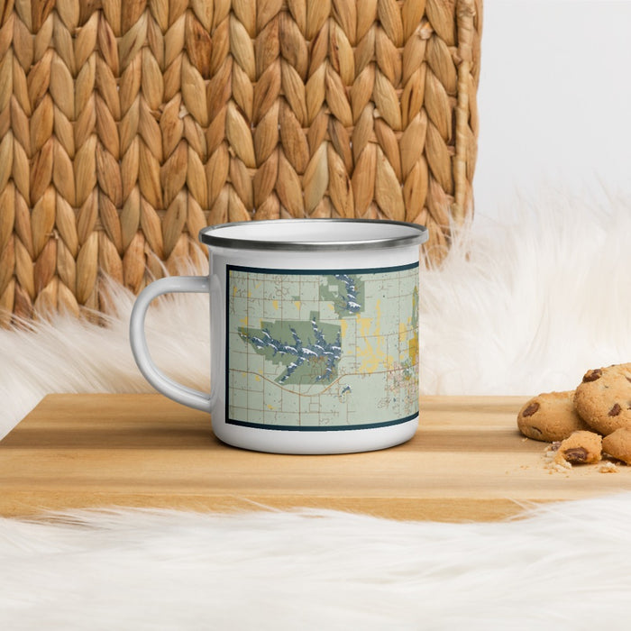 Left View Custom Stillwater Oklahoma Map Enamel Mug in Woodblock on Table Top