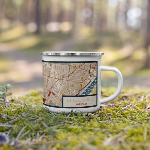 Right View Custom St. Louis Hills Missouri Map Enamel Mug in Woodblock on Grass With Trees in Background