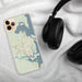 Custom St. Marys Georgia Map Phone Case in Woodblock on Table with Black Headphones