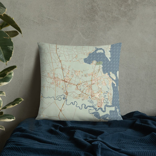 Custom St. Marys Georgia Map Throw Pillow in Woodblock on Bedding Against Wall