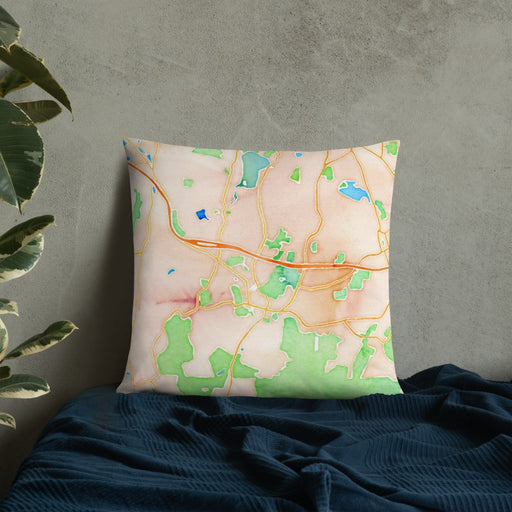 Custom Stockbridge Massachusetts Map Throw Pillow in Watercolor on Bedding Against Wall