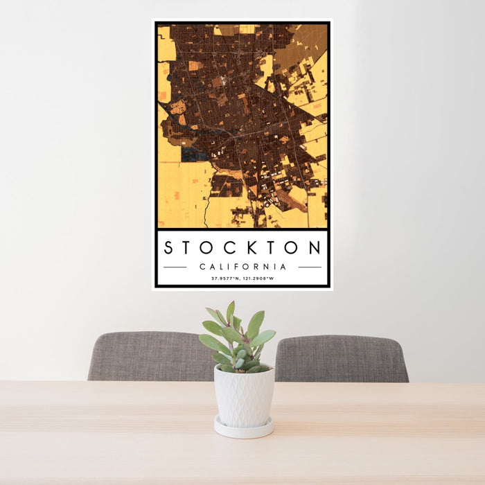 24x36 Stockton California Map Print Portrait Orientation in Ember Style Behind 2 Chairs Table and Potted Plant