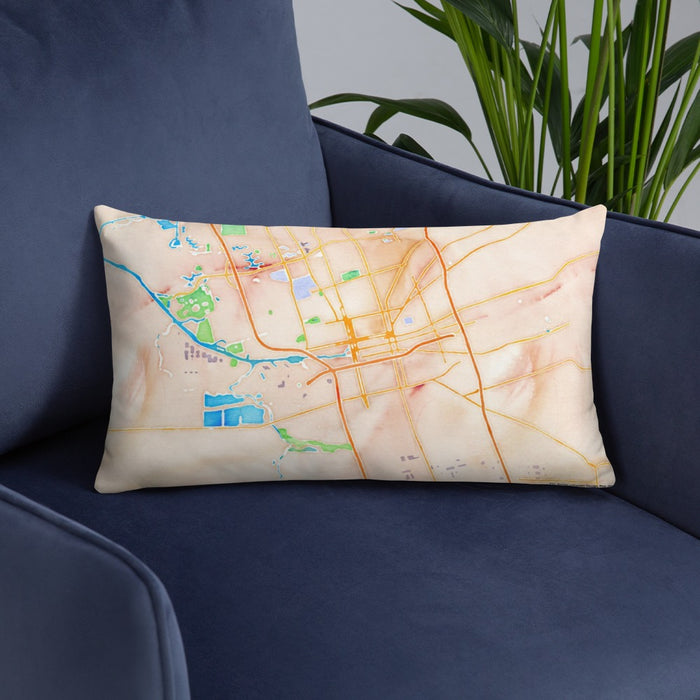 Custom Stockton California Map Throw Pillow in Watercolor on Blue Colored Chair
