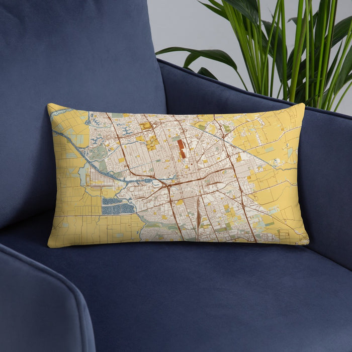 Custom Stockton California Map Throw Pillow in Woodblock on Blue Colored Chair