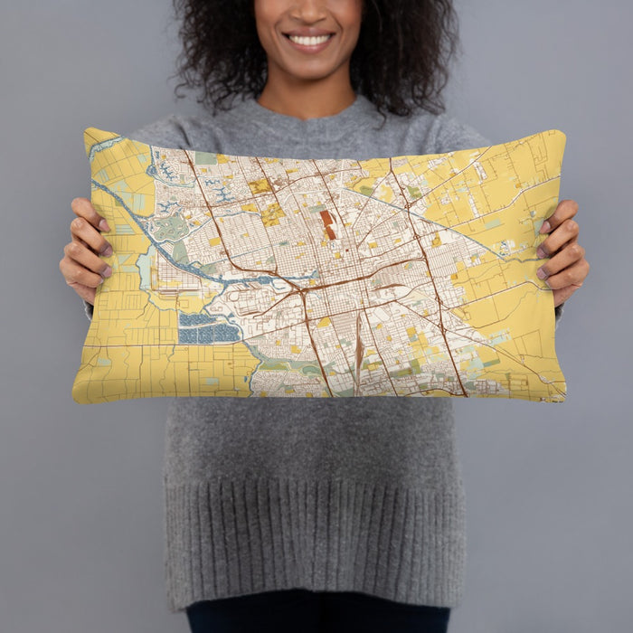 Person holding 20x12 Custom Stockton California Map Throw Pillow in Woodblock