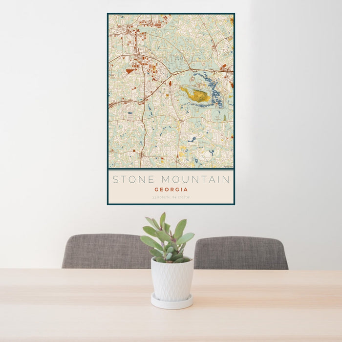 24x36 Stone Mountain Georgia Map Print Portrait Orientation in Woodblock Style Behind 2 Chairs Table and Potted Plant