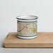 Front View Custom Stone Mountain Georgia Map Enamel Mug in Woodblock on Cutting Board