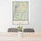 24x36 Stowe Vermont Map Print Portrait Orientation in Woodblock Style Behind 2 Chairs Table and Potted Plant