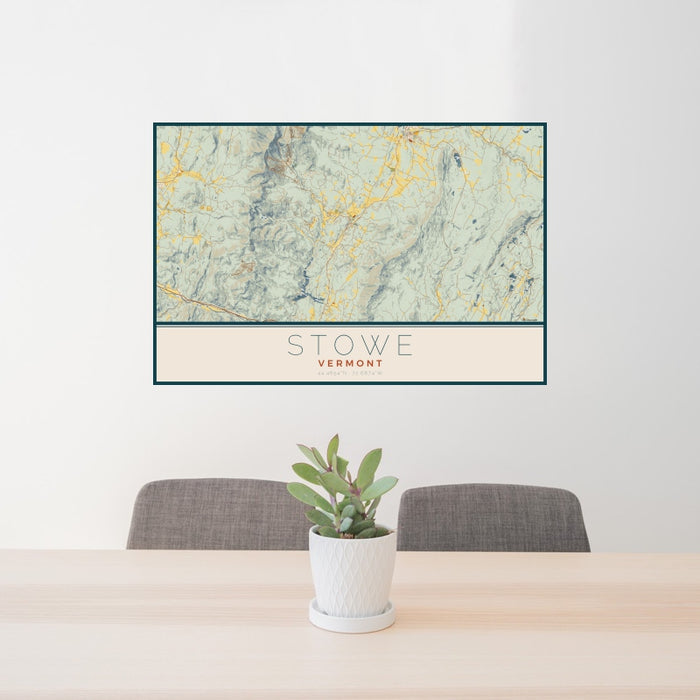24x36 Stowe Vermont Map Print Landscape Orientation in Woodblock Style Behind 2 Chairs Table and Potted Plant