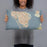 Person holding 20x12 Custom St. Petersburg Florida Map Throw Pillow in Woodblock