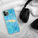 Custom St. Thomas U.S. Virgin Islands Map Phone Case in Watercolor on Table with Black Headphones