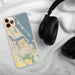 Custom Stuart Florida Map Phone Case in Woodblock on Table with Black Headphones