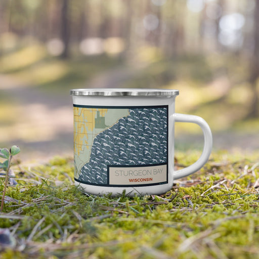 Right View Custom Sturgeon Bay Wisconsin Map Enamel Mug in Woodblock on Grass With Trees in Background