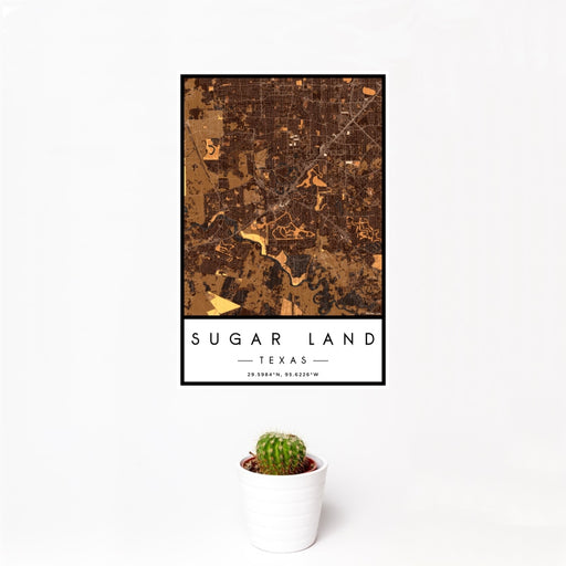 12x18 Sugar Land Texas Map Print Portrait Orientation in Ember Style With Small Cactus Plant in White Planter