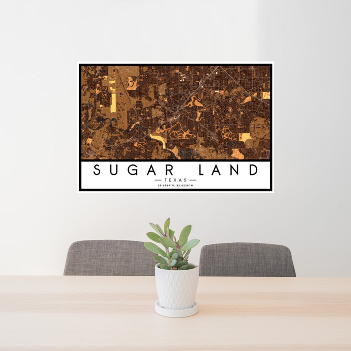 24x36 Sugar Land Texas Map Print Landscape Orientation in Ember Style Behind 2 Chairs Table and Potted Plant
