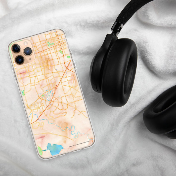 Custom Sugar Land Texas Map Phone Case in Watercolor on Table with Black Headphones
