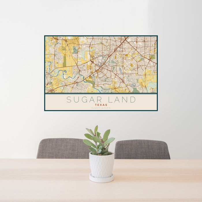 24x36 Sugar Land Texas Map Print Landscape Orientation in Woodblock Style Behind 2 Chairs Table and Potted Plant
