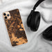 Custom Sullivan Missouri Map Phone Case in Ember on Table with Black Headphones