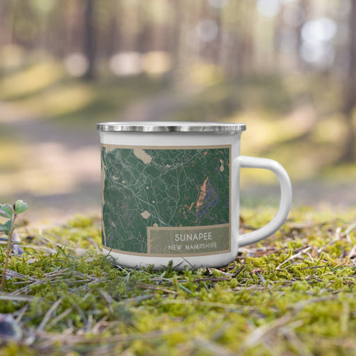 Right View Custom Sunapee New Hampshire Map Enamel Mug in Afternoon on Grass With Trees in Background