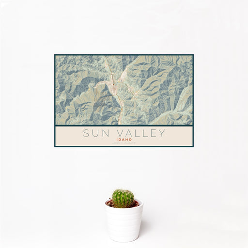 12x18 Sun Valley Idaho Map Print Landscape Orientation in Woodblock Style With Small Cactus Plant in White Planter